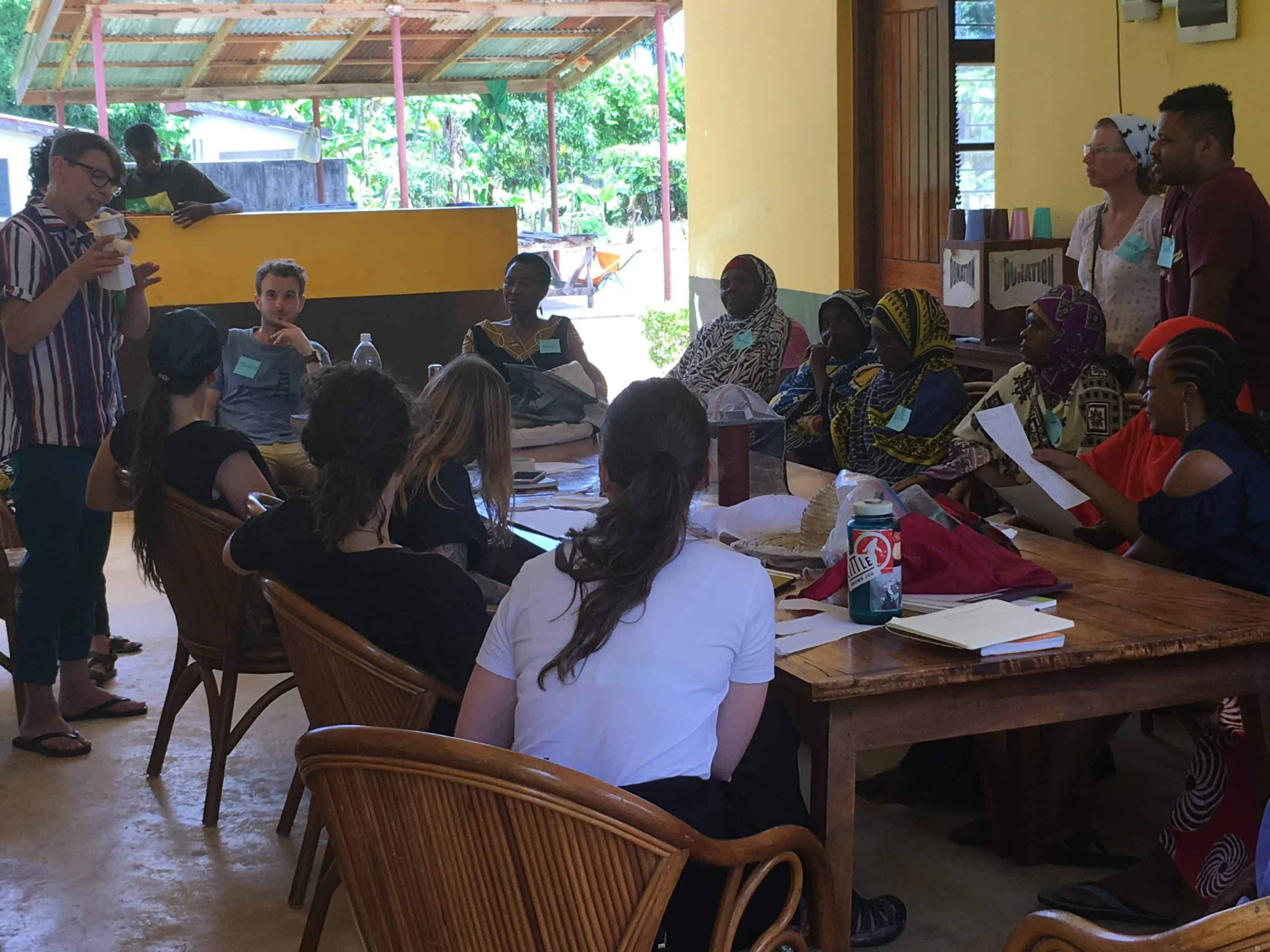 product designers discuss design concepts with local entrepreneurs