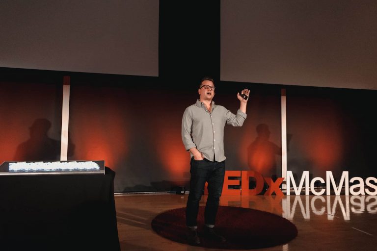 Cortex President Dylan Horvath speaking at TEDx McMaster.